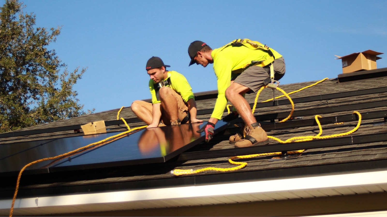 men working on a roof